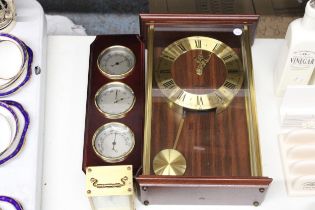 A METAMAC QUARTZ WALL CLOCK, A CARRIAGE CLOCK AND A BAROMETER, CLOCK AND THERMOMETER IN A WOODEN