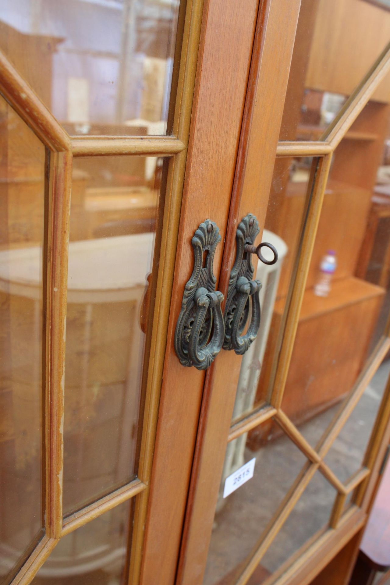 A MODERN ASTRAGAL GLAZED TWO DOOR CABINET ON BASE - Image 4 of 6