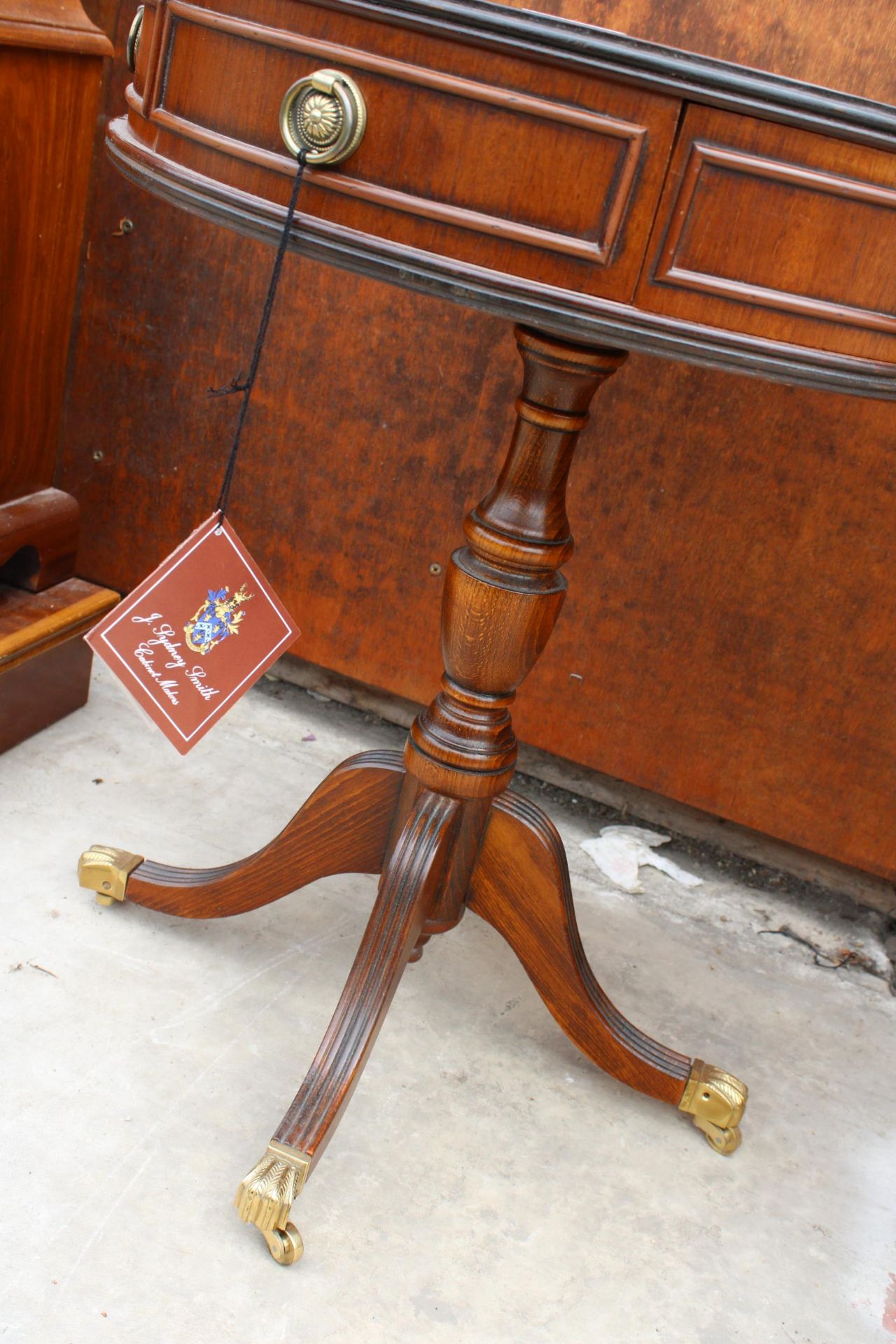 A MAHOGANY AND CROSSBANDED DRUM TABLE BY J. SYDNEY-SMITH ENCLOSING TWO DRAWERS 19.5" DIAMETER, - Image 2 of 3