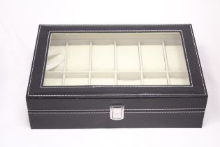 A LEATHER WRISTWATCH CASE FOR 12 WATCHES