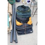 AN ASSORTMENT OF FISHING KEEP NETS AND THREE PIECES OF PLASTIC TUBE