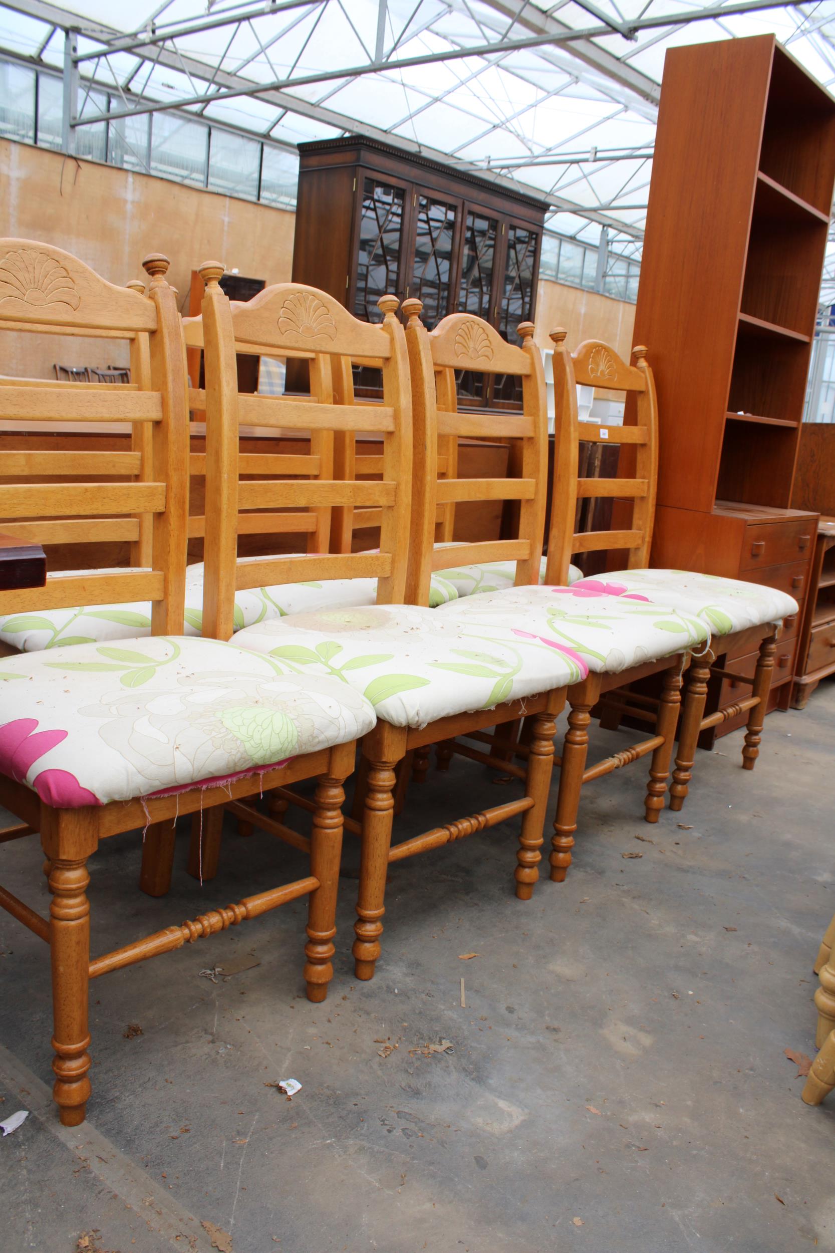 A SET OF SEVEN MODERN HARDWOOD LADDER-BACK DINING CHAIRS - Image 2 of 3