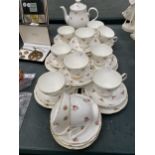 A VINTAGE ARGYLE TEASET TO INCLUDE A TEAPOT, SUGAR BOWL, CUPS, SAUCERS AND SIDE PLATES