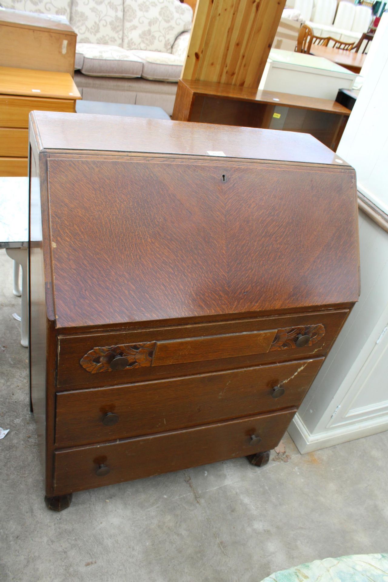 A MID 20TH CENTURY OAK BUREAU, 30" WIDE