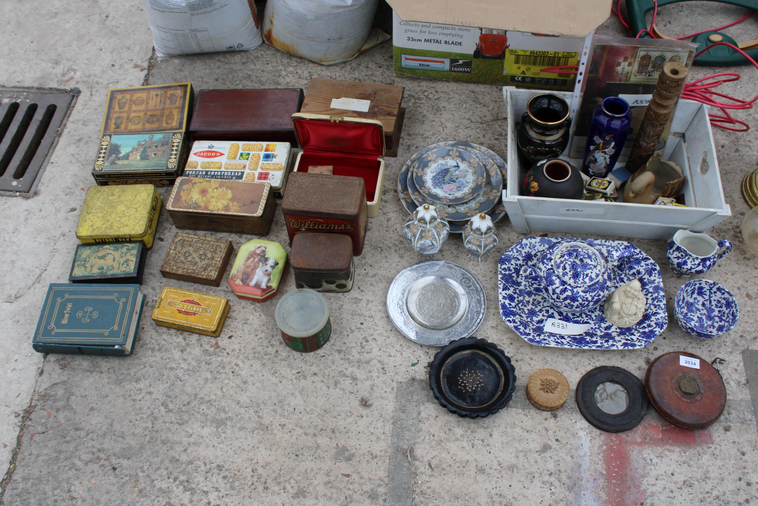 A LARGE ASSORTMENT OF ITEMS TO INCLUDE VINTAGE TINS, BLUE AND WHITE CERAMICS AND VASES ETC