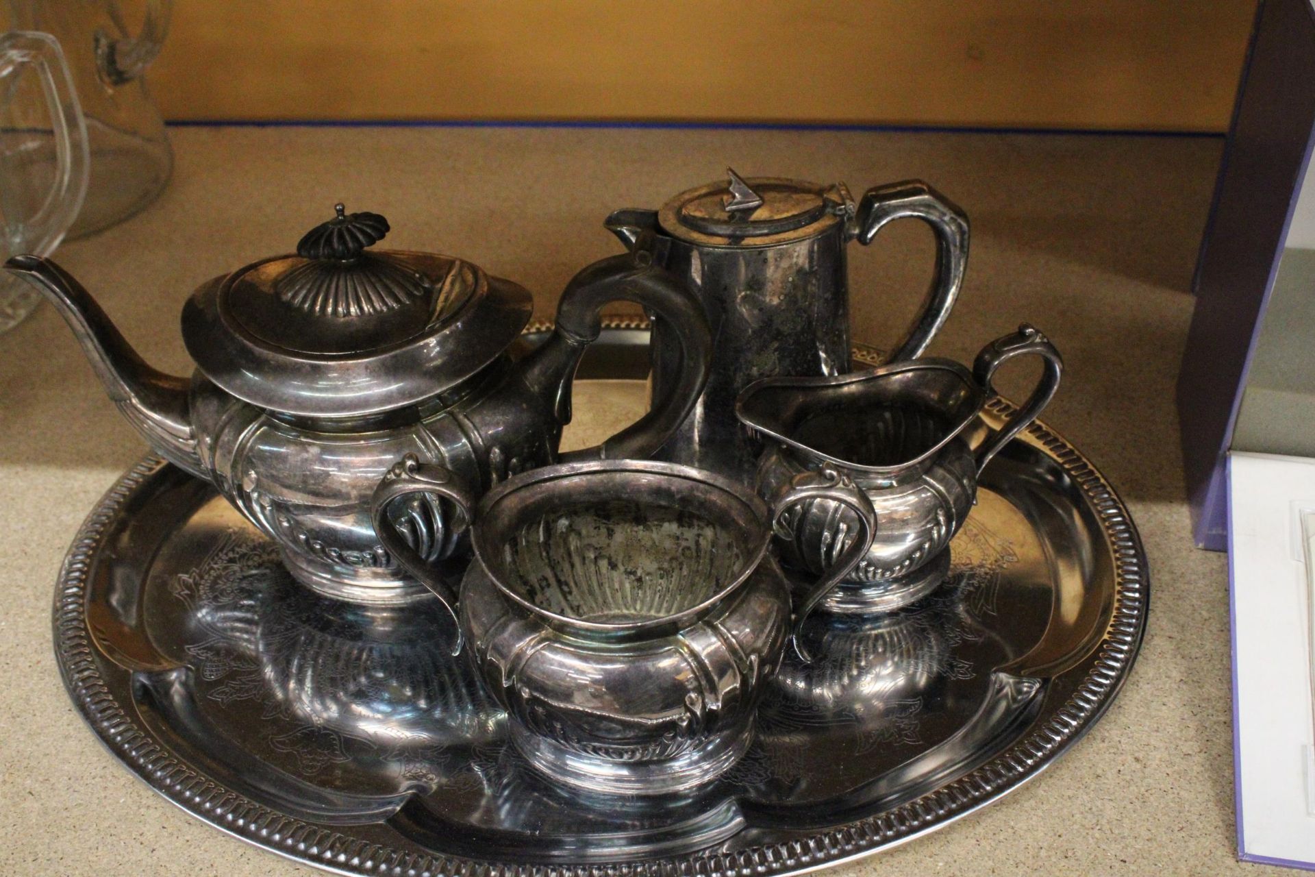 A LARGE TRAY TO INCLUDE SILVER PLATED ITEMS