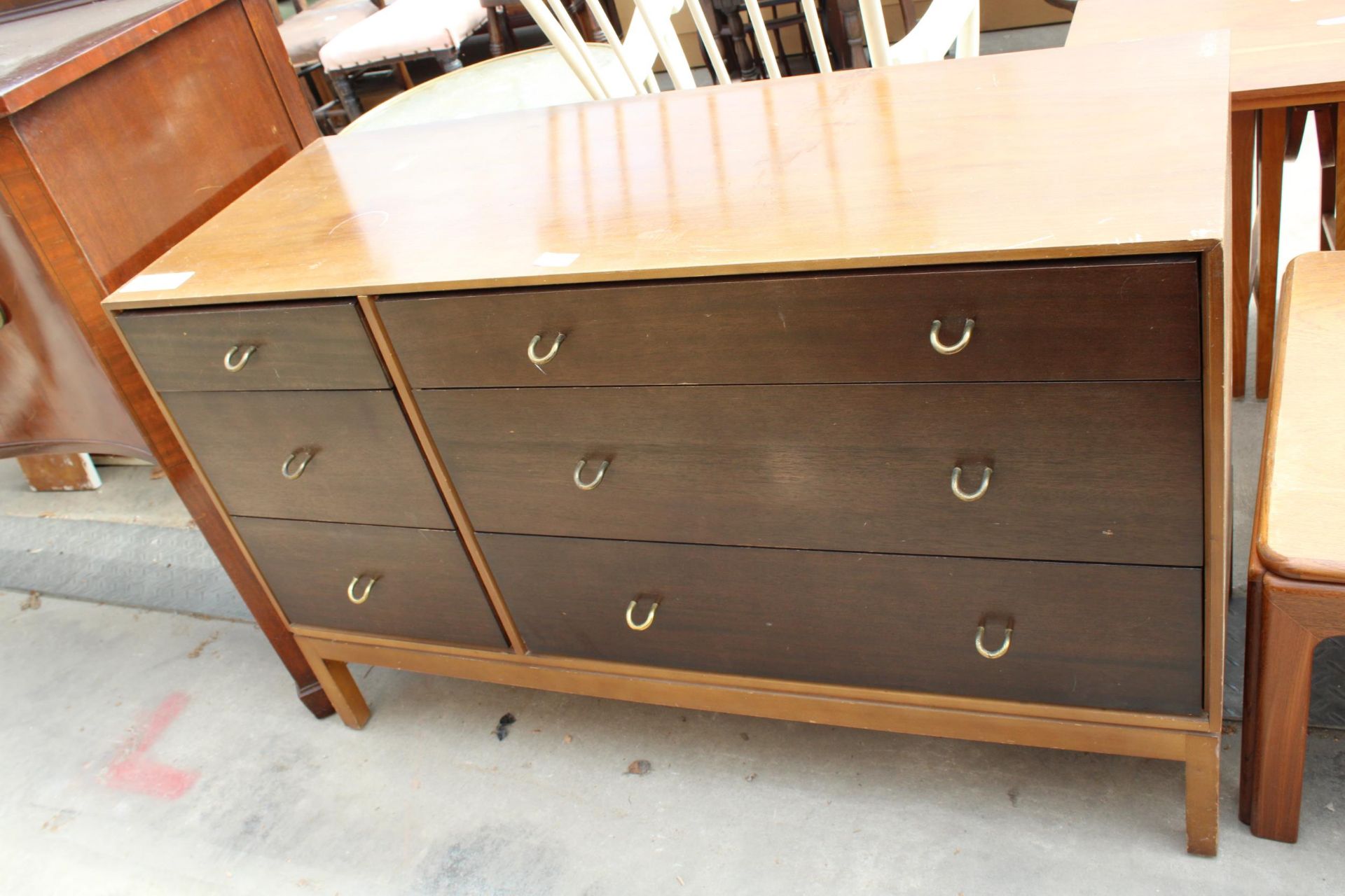 A RETRO TEAK TWO TONE CHEST OF THREE SHORT AND THREE LONG DRAWERS, 44" WIDE