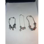 THREE SILVER CHARM BRACELETS TO INCLUDE A DISNEY EXAMPLE