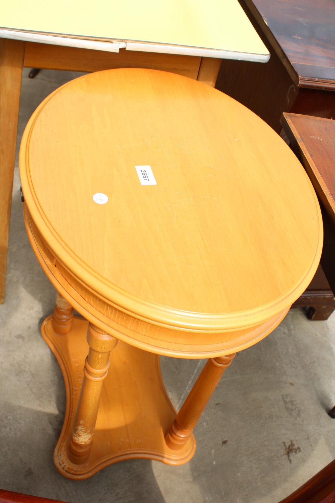A MODERN OVAL TWO TIER SIDE-TABLE WITH SINGLE DRAWER, 20.5" X 17" - Bild 2 aus 2