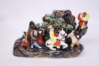 A CHINESE PORCELAIN LARGE FIGURAL GROUP OF MYTHICAL CHINESE CHARACTERS