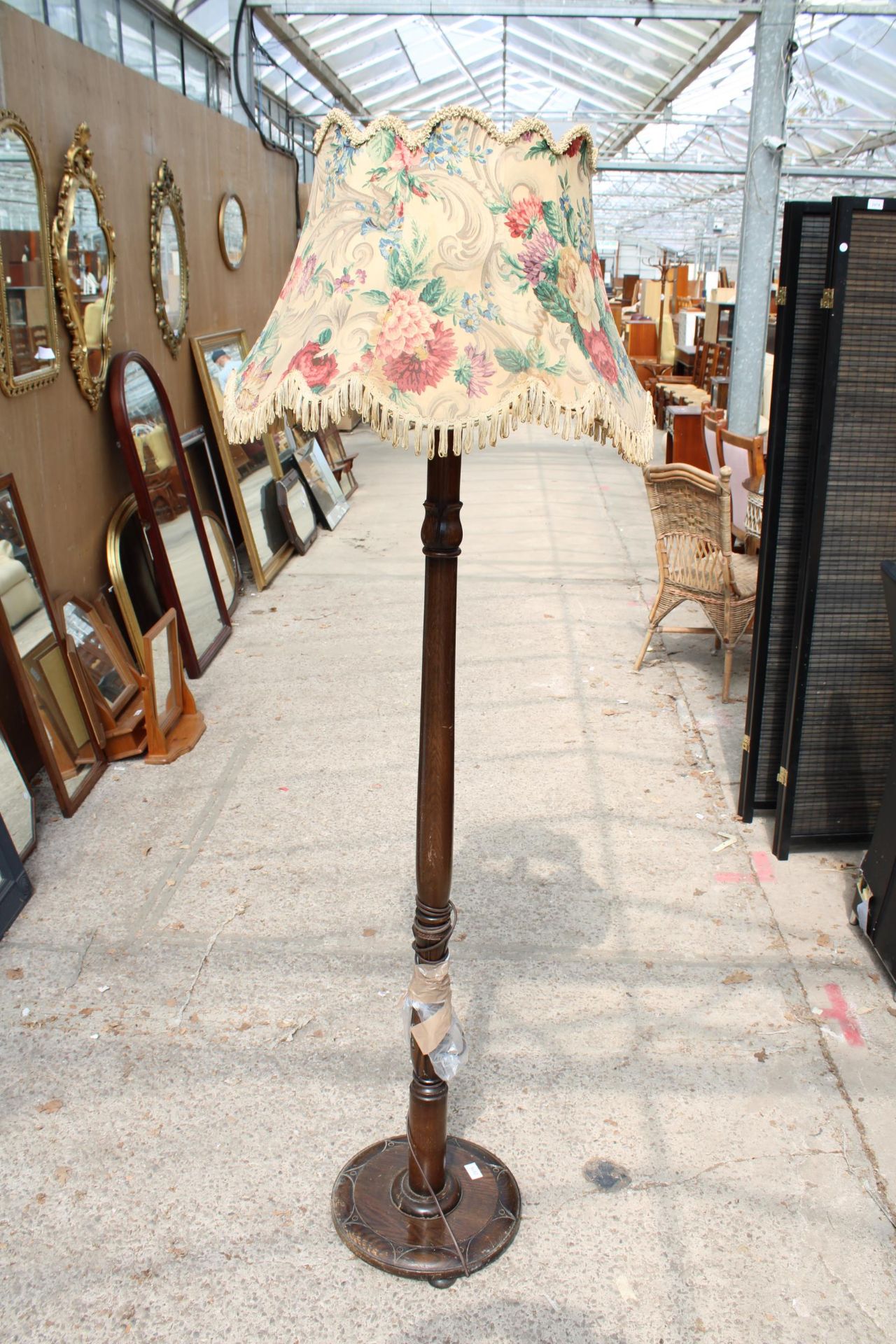 A MID 20TH CENTURY STANDARD LAMP WITH SHADE