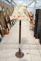 A MID 20TH CENTURY STANDARD LAMP WITH SHADE