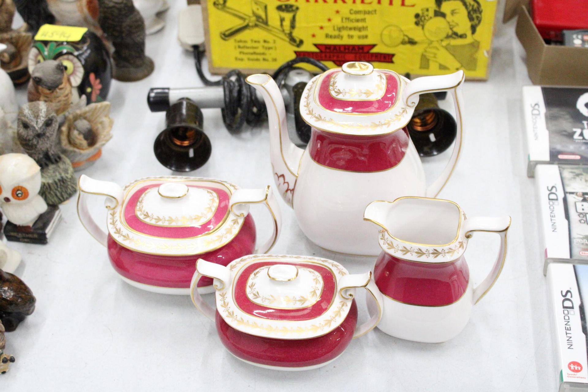A SPODE BONE CHINA COFFEE SET COMPRISING OF A COFFEE POT, JUG, LIDDED CREAM AND SUGAR