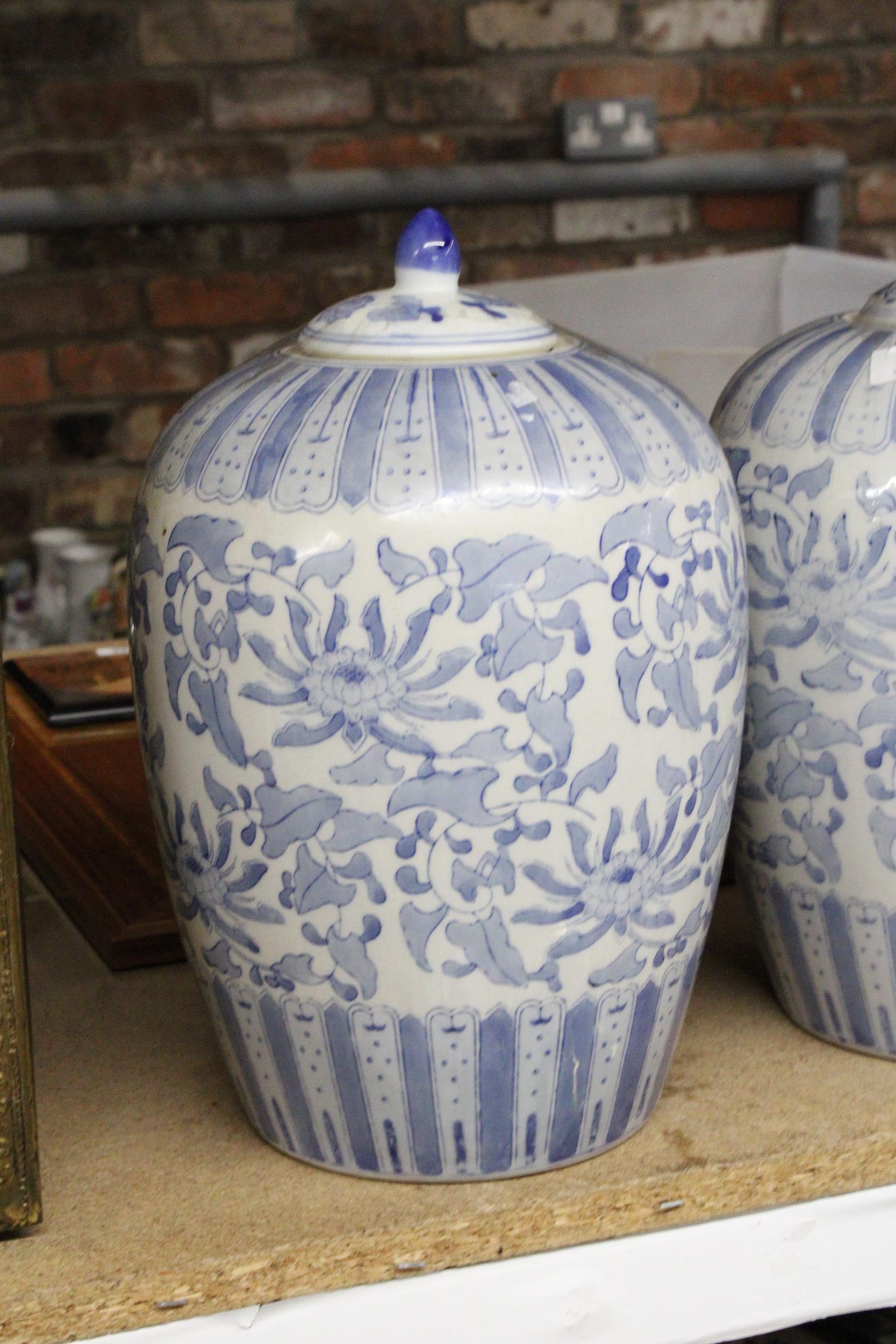 A PAIR OF LARGE BLUE AND WHITE LIDDED JARS, HEIGHT APPROX 32CM - Image 2 of 4