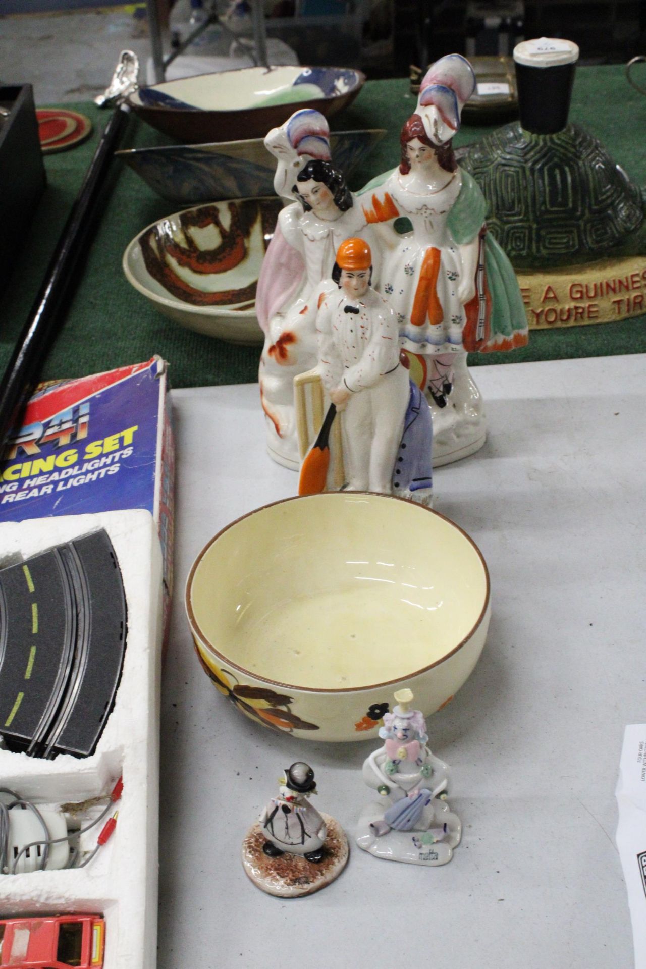 TWO VINTAGE STAFFORDSHIRE FLATBACKS TO INCLUDE A CRICKETER, A MYOTT AND SONS HANDPAINTED BOWL AND