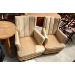 A PAIR OF MODERN LOW UPHOLSTERED LOUNGE CHAIRS