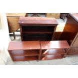 AN OPEN MAHOGANY BOOKCASE AND TWO SMALL SHELVES