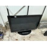 A PANASONIC 37" TELEVISION WITH REMOTE CONTROL