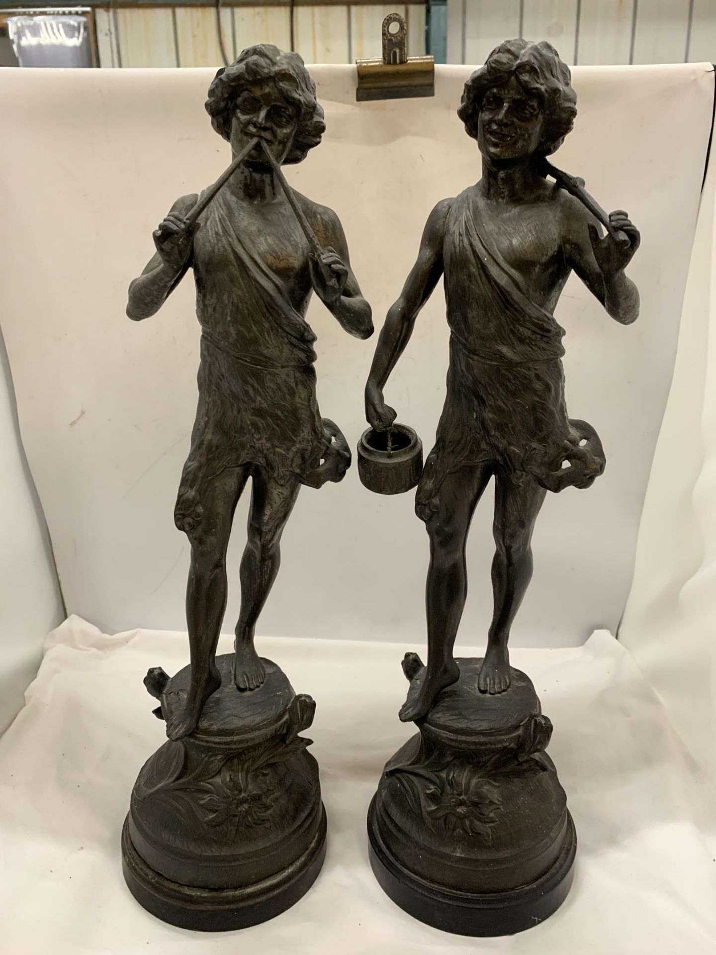 A LARGE PAIR OF SPELTER FIGURES OF BOYS - APPROXIMATELY 54CM HIGH