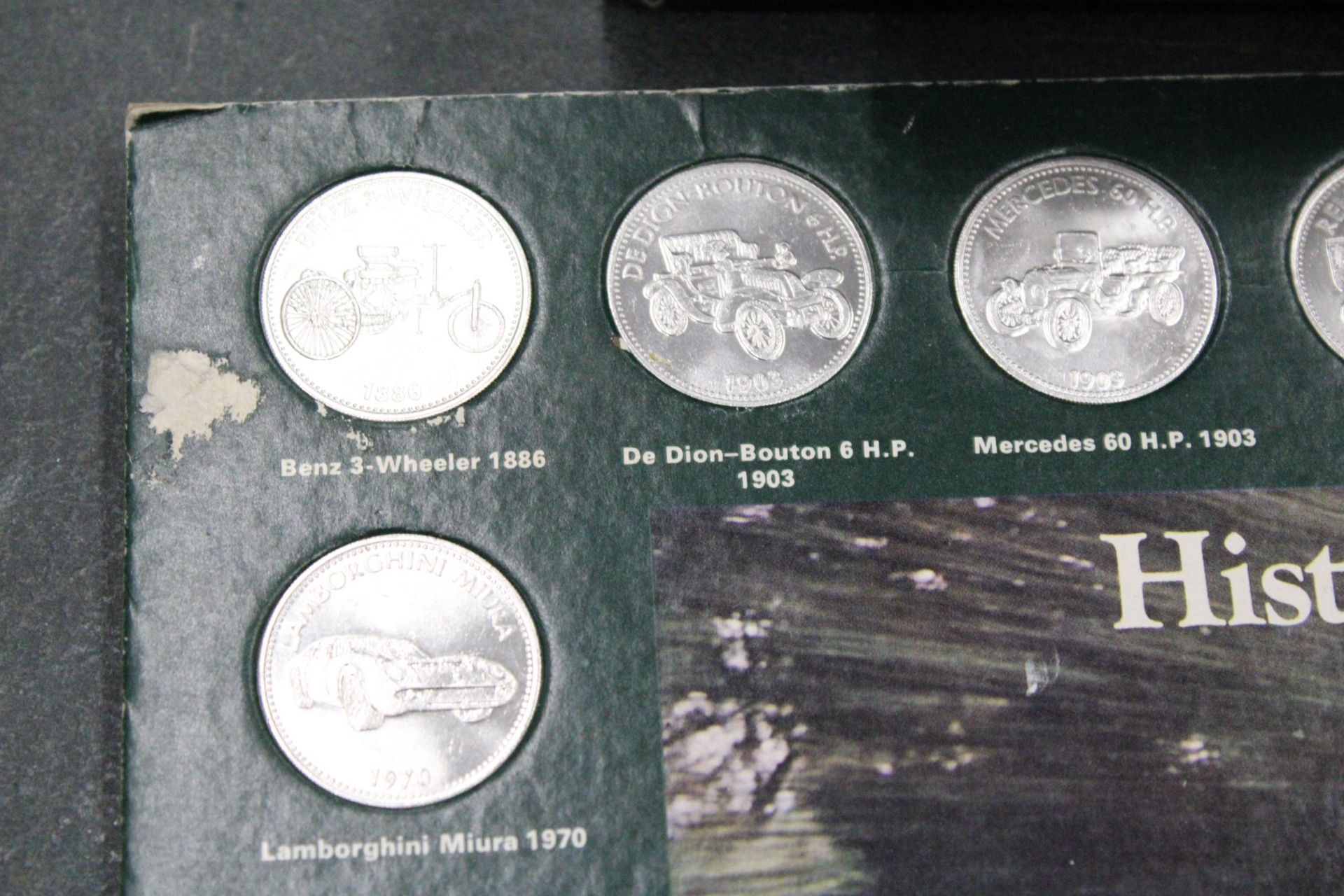 THREE SETS OF SHELL COLLECTABLE COINS ON CARDS, TO INCLUDE MAN'S FIRST FLIGHT X 2 AND HISTORIC CARS - Image 7 of 7