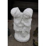 A WHITE PAINTED CONCRETE GARDEN FIGURE OF TWO CHILDREN