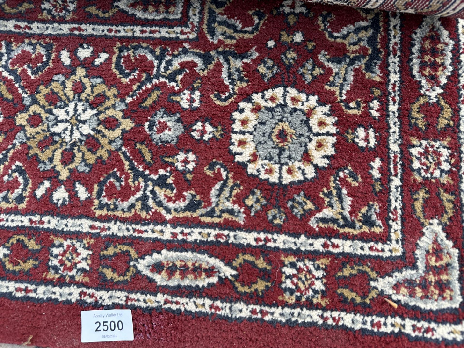 A RED PATTERNED RUG - Image 2 of 3