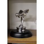A CHROME FLYING LADY ON A BASE, HEIGHT 14.5CM