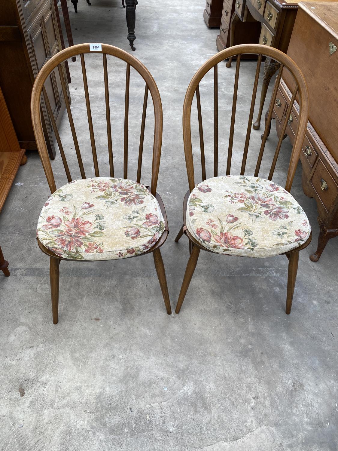 A PAIR OF ERCOL ELM AND BEECH WINDSOR STYLE DINING CHAIRS