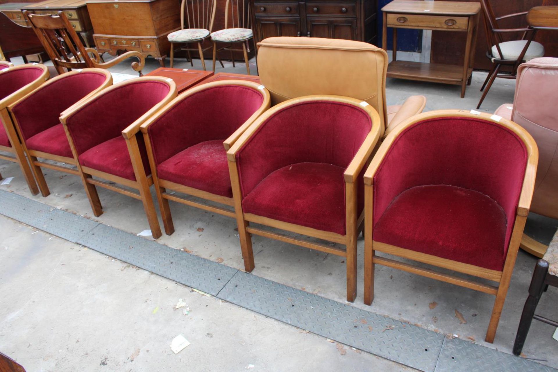 A SET OF FIVE FOREMOST FURNITURE UPHOLSTERED TUB CHAIRS