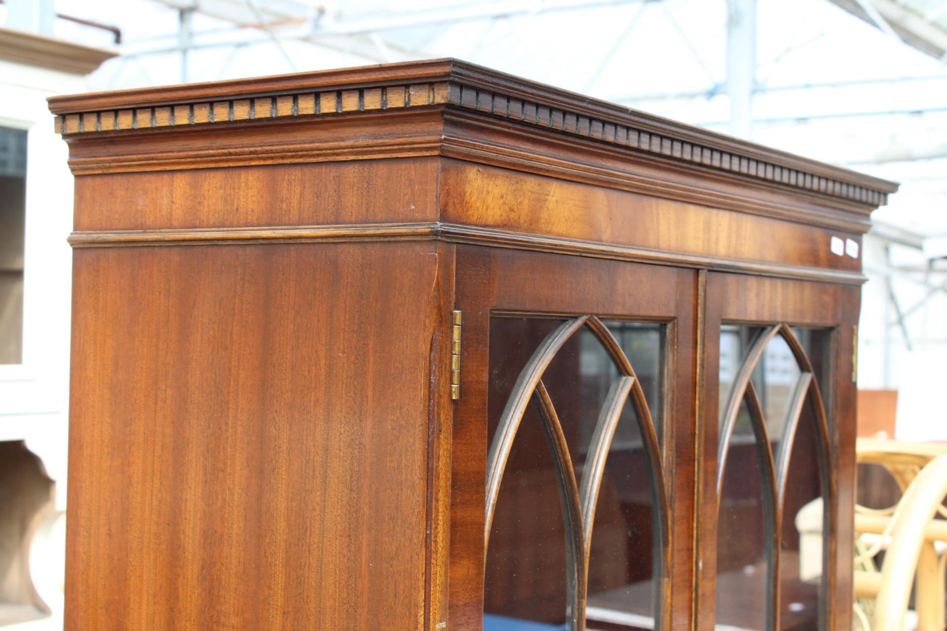 A MAHOGANY REPRODUX, BEVAN FUNNELL TWO DOOR BOOKCASE ON BASE WITH THREE DRAWERS AND SLIDE, 30" - Image 2 of 5