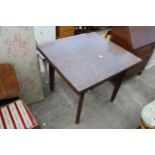 A MID 20TH CENTURY OAK DRAW-LEAF TABLE WITH FORMICA WALNUT TOP