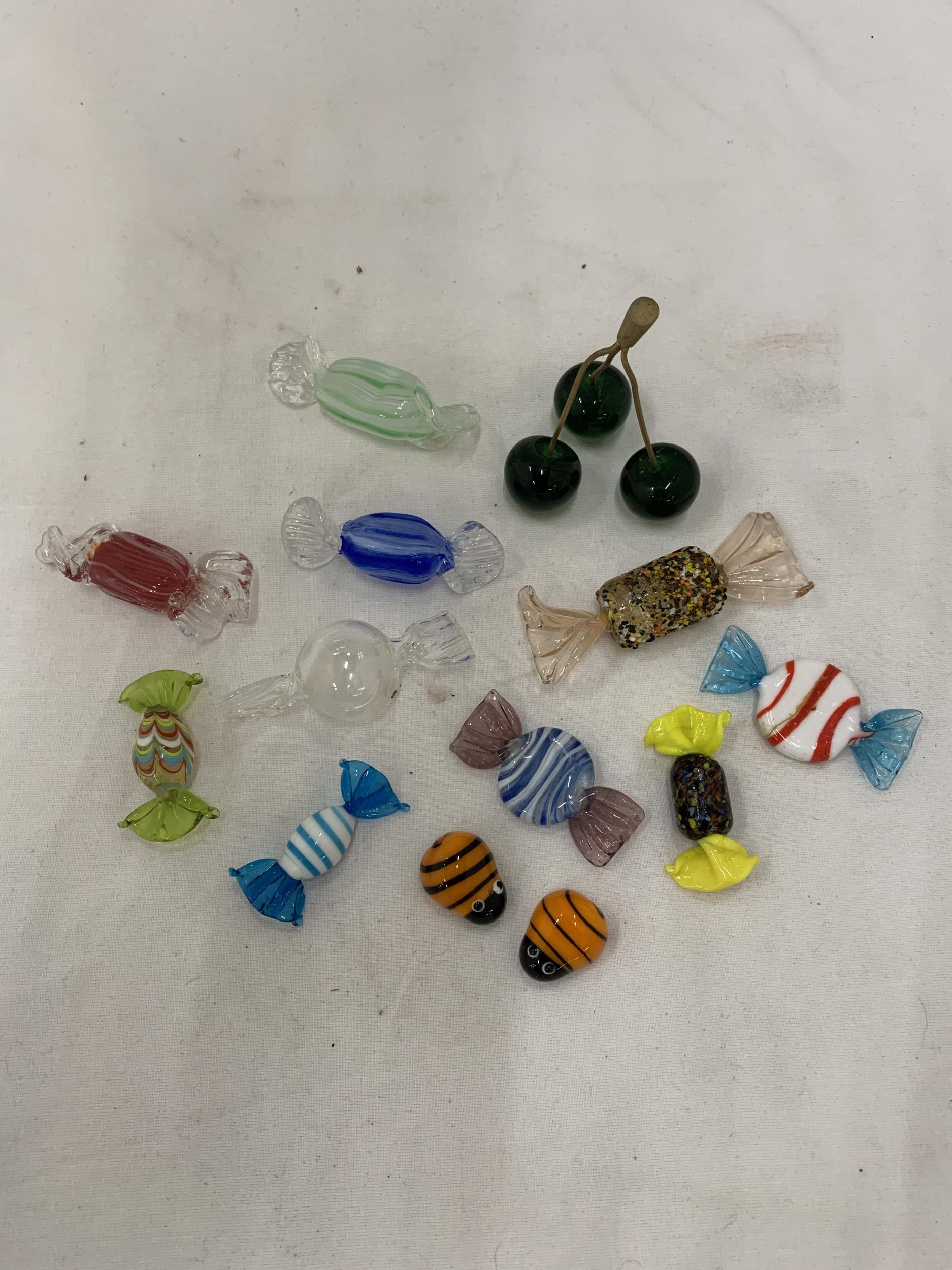 TEN MURANO STYLE GLASS SWEETS, PLUS CHERRIES AND TWO GLASS BEES