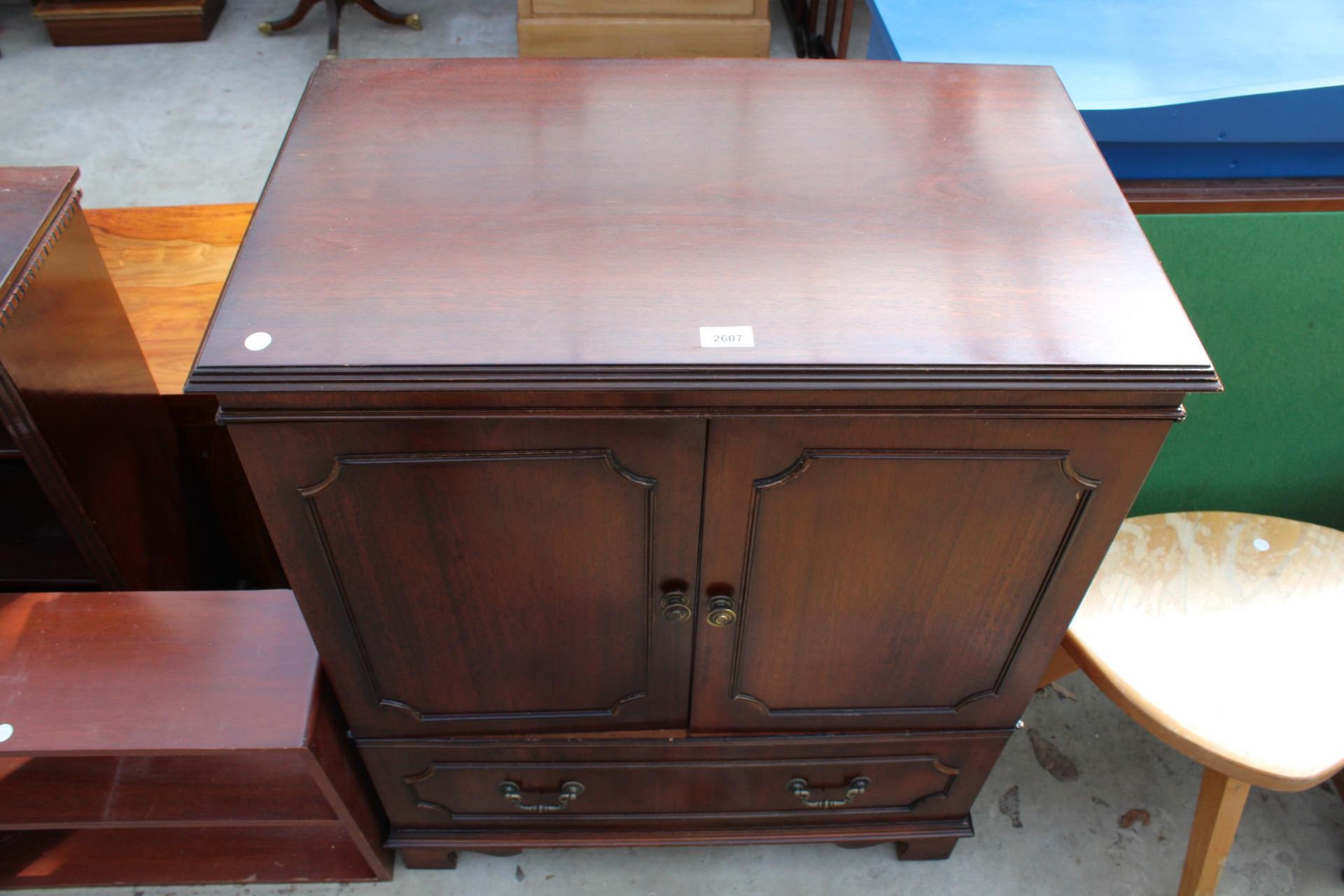 A MAHOGANY TWO DOOR T.V. CABINET - Image 3 of 3