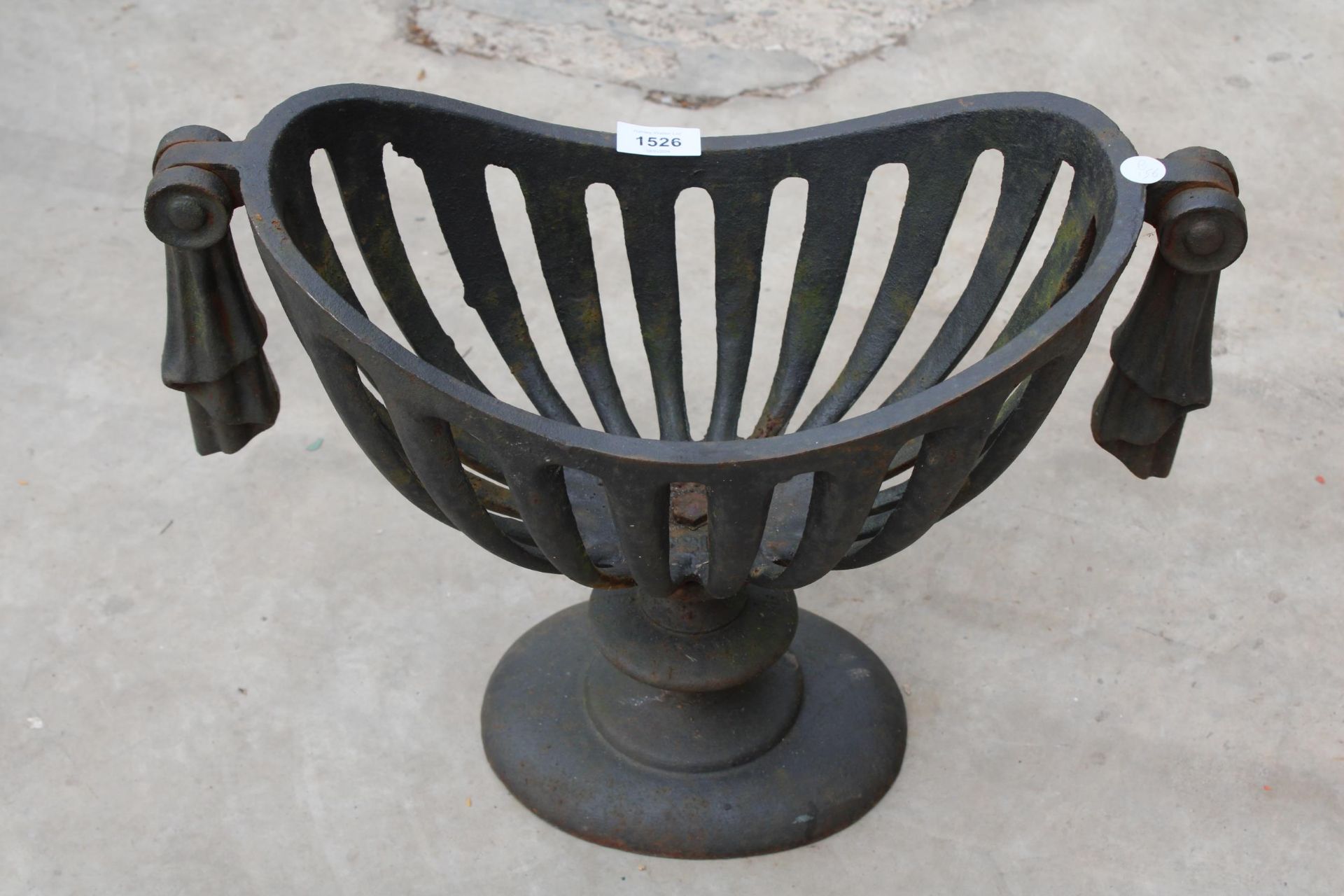 A DECORATIVE CAST IRON PLANTER