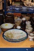 A LARGE COLLECTION OF STUDIO POTTERY TO INCLUDE VASES, GOBLETS, COOKING POTS, ETC