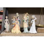 A COLLECTION OF TEN LADY FIGURINES