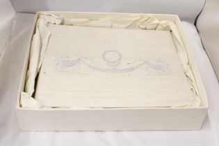 A LARGE PHOTOGRAPH ALBUM WITH AN EMBROIDERED SILK COVER