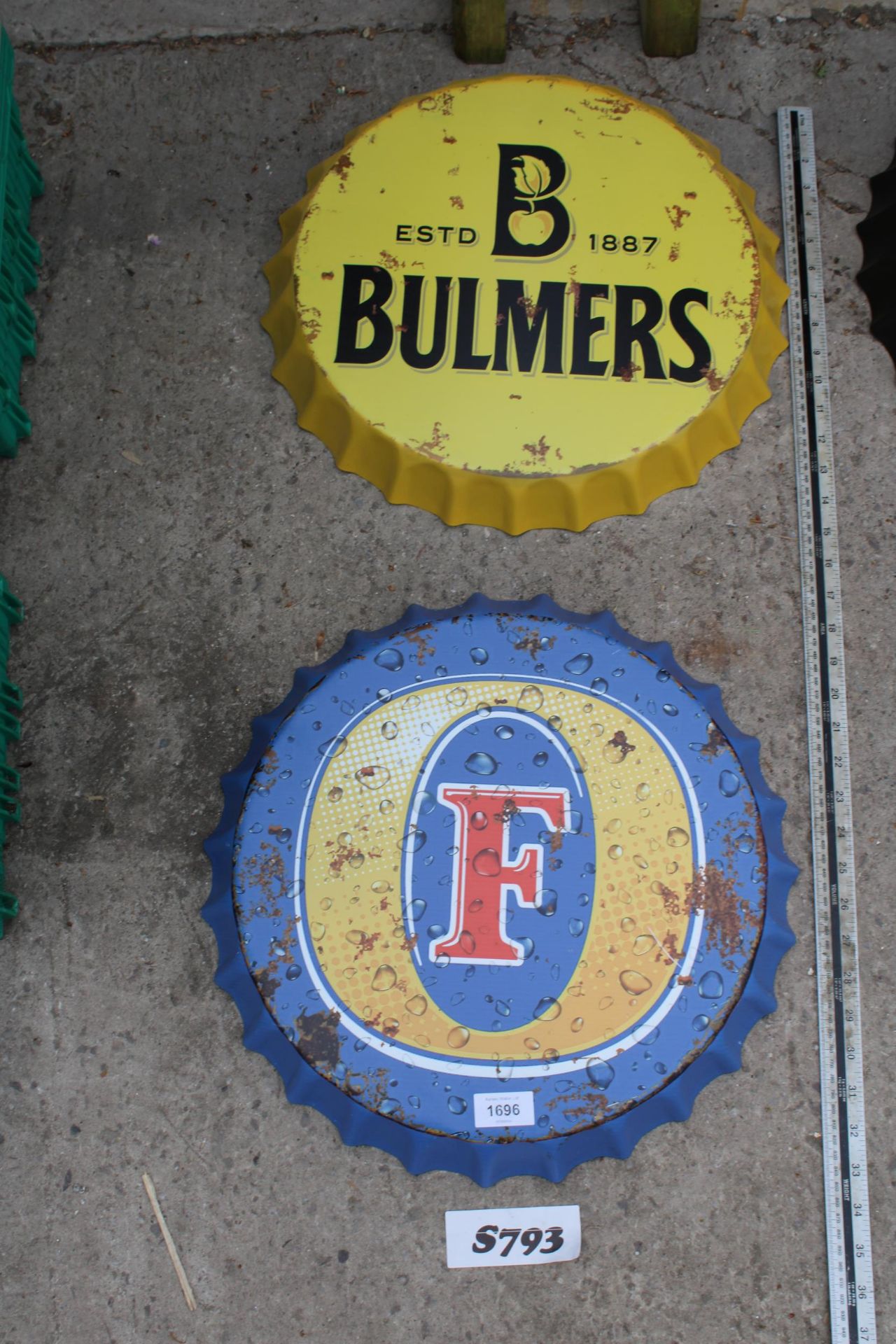 TWO BOTTLE CAP STYLE SIGNS TO INCLUDE BULMERS