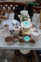 AN ASSORTMENT OF CERAMICS TO INCLUDE FOUR JACKFIELD STYLE JUGS, TEAPOTS AND PLATES ETC