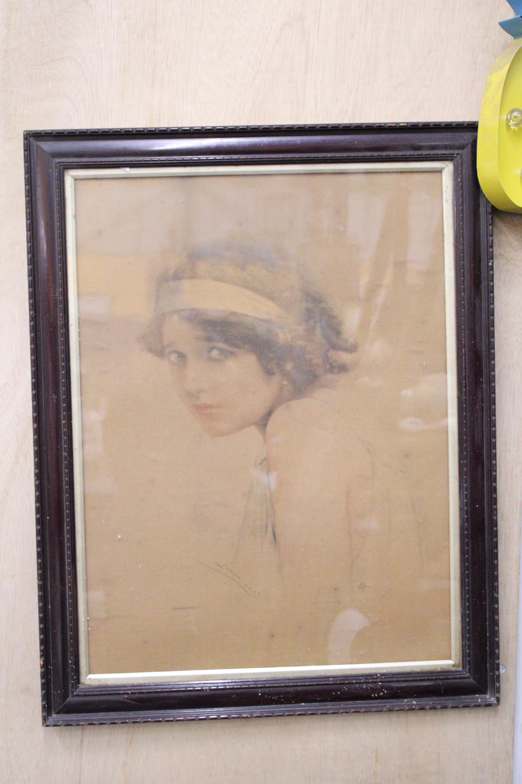 A LARGE PRINT OF A YOUNG LADY, 60CM X 76CM