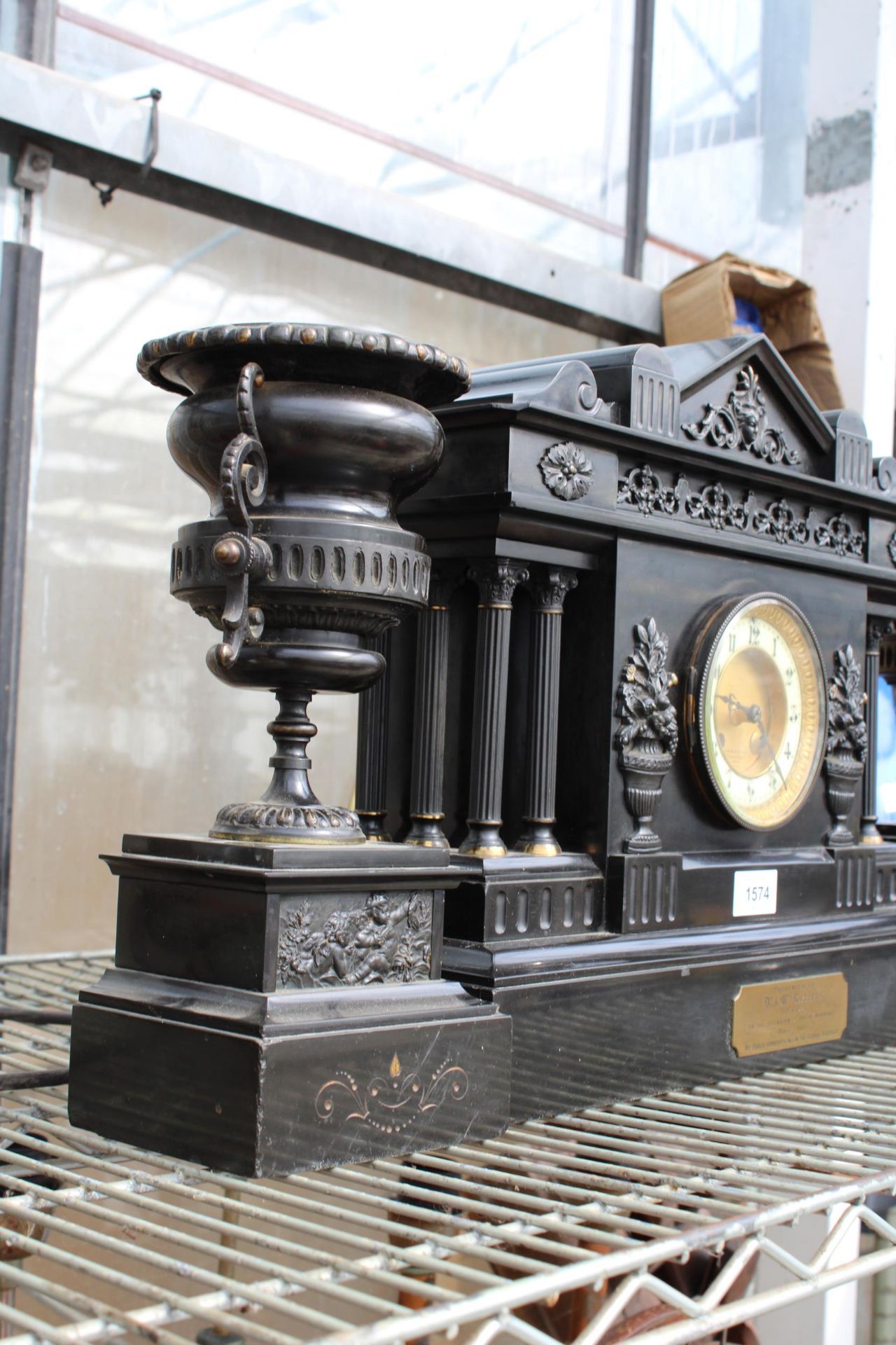 A HEAVY SLATE MANTLE CLOCK WITH A PAIR OF MATCHING CANDLE HOLDERS WITH PLAQUE INSCRIBED 'PRESENTED - Image 3 of 4