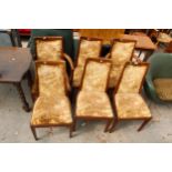 A SET OF SIX RETRO TEAK G.PLAN DINING CHAIRS, TWO BEING CARVERS