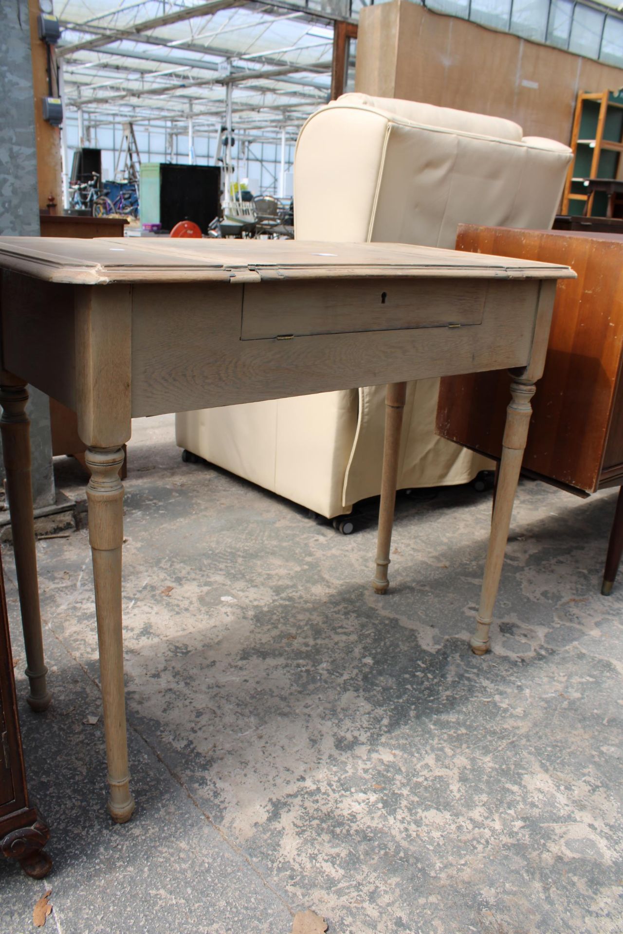 AN EARLY 20TH CENTURY OAK 'THE BRITISHER DESK' WITH FOLD-OUT WRITING AND STORAGE SECTIONS, 36" WIDE - Image 6 of 6