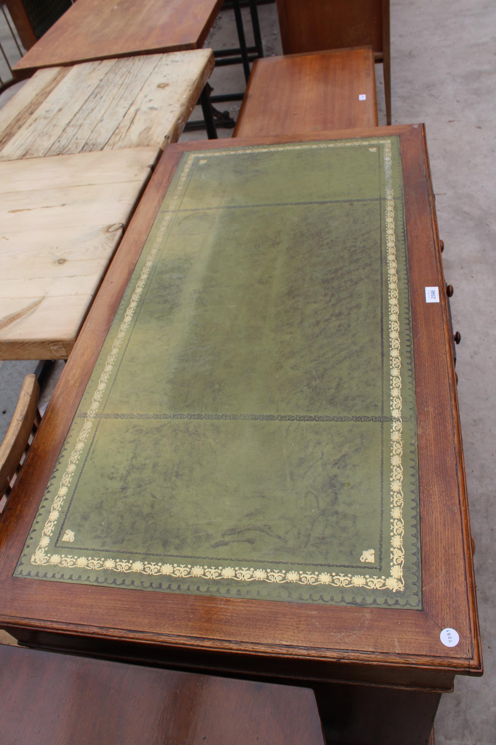 AN EDWARDIAN OAK TWIN-PEDESTAL DESK ENCLOSING NINE DRAWERS WITH INSET LEATHER TOP, 48" X 25" - Image 4 of 4