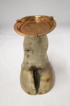 A COWS HOOF WITH COPPER ASHTRAY