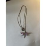 A MARKED 925 SILVER NECKLACE WITH A SILVER AND COLOURED STONE DRAGONFLY PENDANT