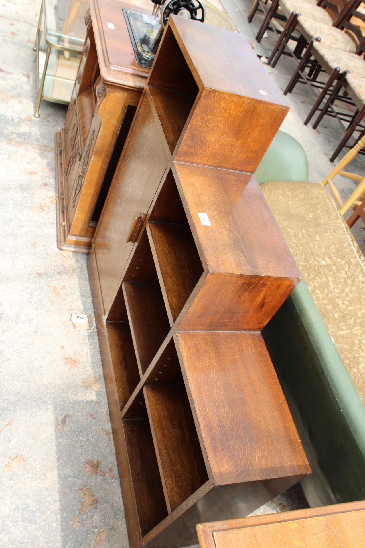 A MID 20TH CENTURY STEPPED OAK BOOKCASE WITH SINGLE CUPBOARD, 42" WIDE, BEARING JONES MOSS & CO, - Image 3 of 3