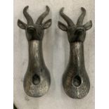 A PAIR OF STAG HEAD COAT HOOKS