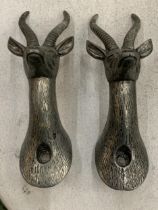 A PAIR OF STAG HEAD COAT HOOKS