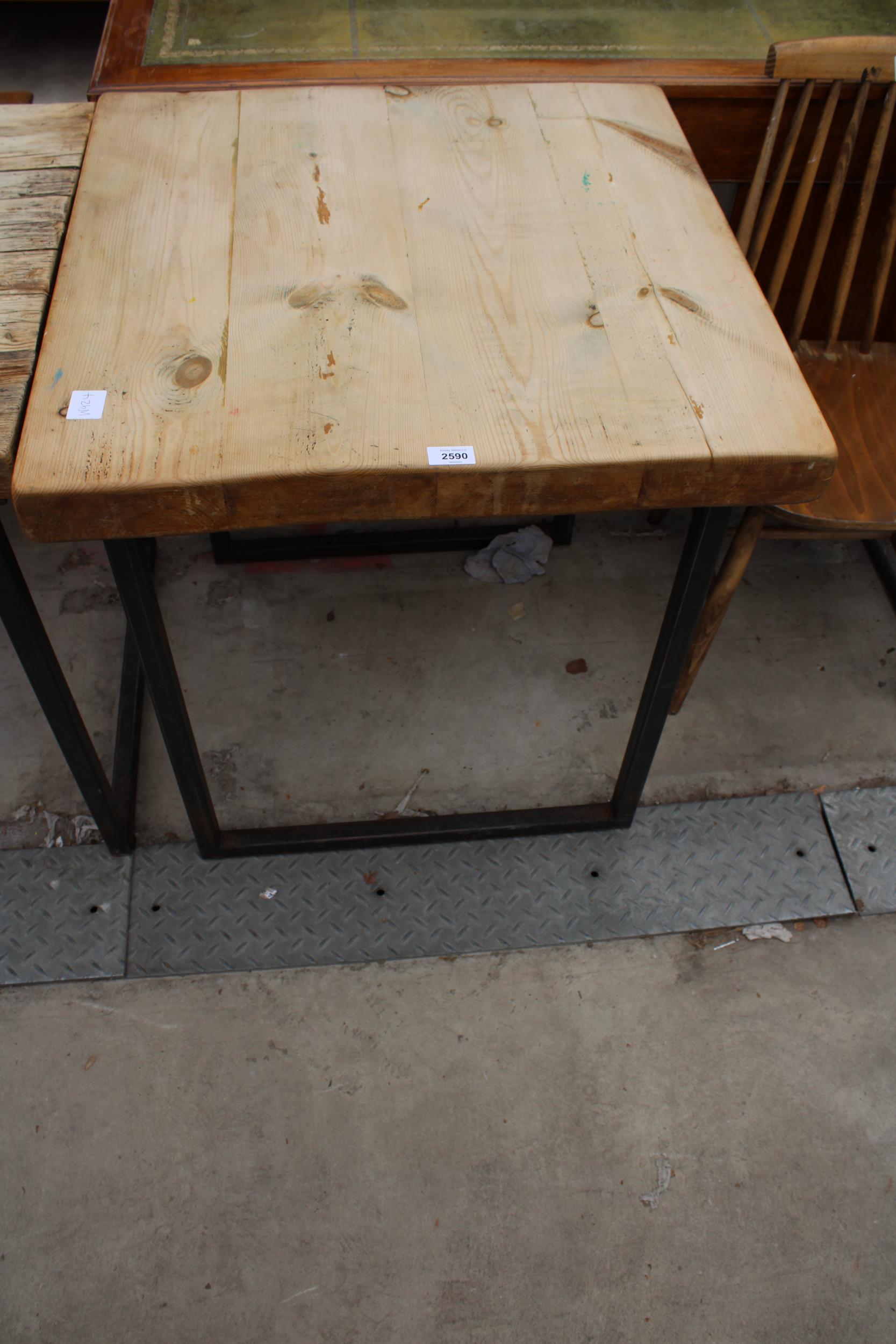 A RUSTIC FOUR PLANK TABLE, 27" SQUARE ON METAL LEGS